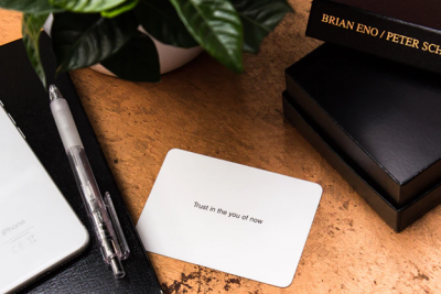 blank business card saying - trust in the you of now